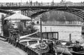 Barges moored to the embankment of the river Seine in Paris. Royalty Free Stock Photo